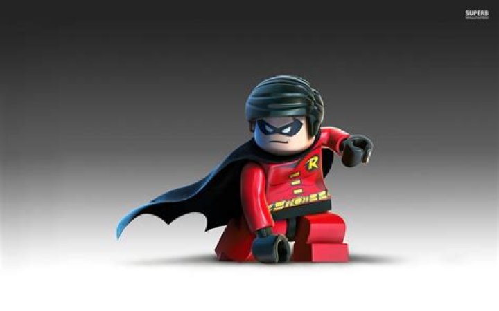 How do I use the gun that comes with Robin's Biohazard suite in Lego Batman 2?