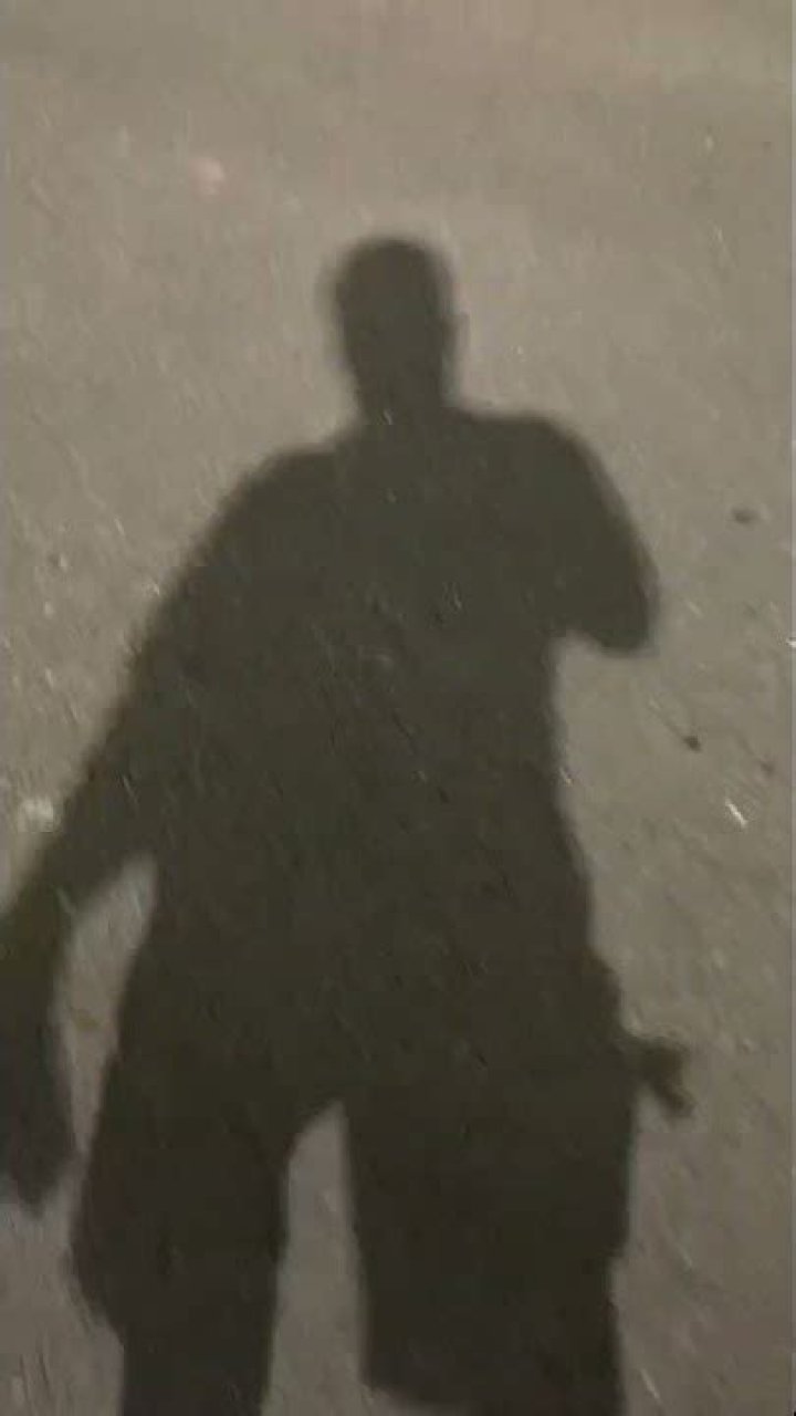 Who is this shadowy figure?